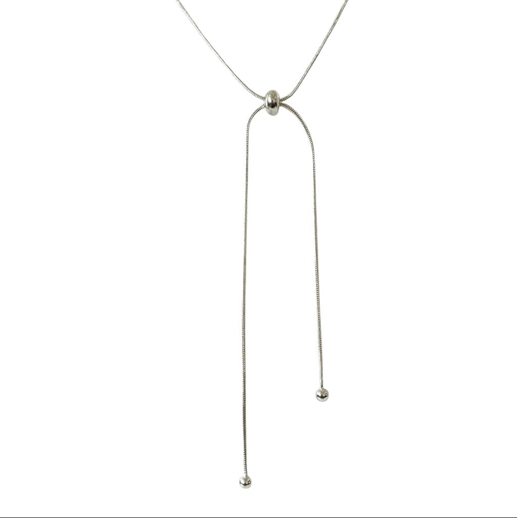 Thin silver necklace on a white background