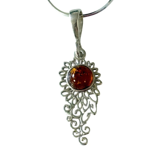 Silver pendant with a central amber stone on a white background